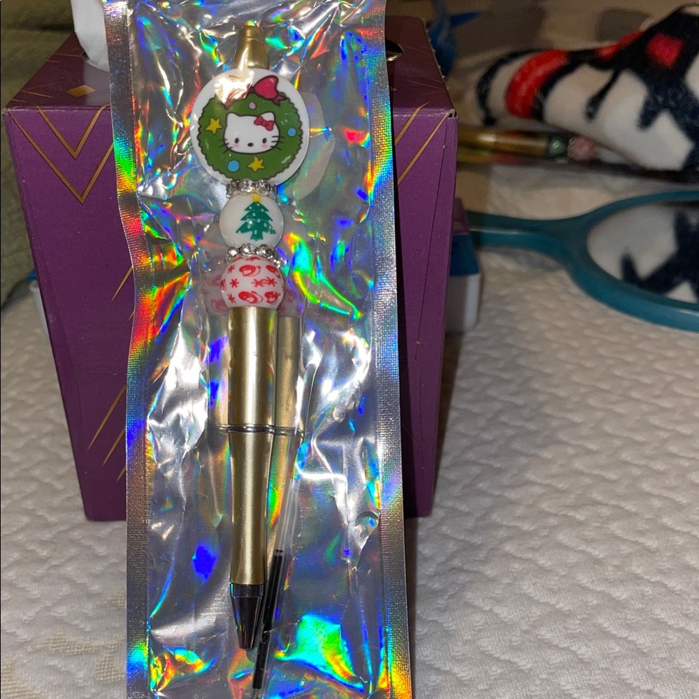 Hello Kitty Gold and White Pen